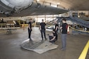 DAYTON, Ohio -- Restoration crews from the National Museum of the U.S. Air Force install the final wing-tip on the Boeing B-17F Memphis Belle™ on March 22, 2017. The famed B-17F Memphis Belle™ and its crew became iconic symbols of the heavy bomber crews and support personnel who helped defeat Nazi Germany. The Memphis Belle was the first US Army Air Forces heavy bomber to return to the US after completing 25 combat missions over Europe. The USAAF chose the Memphis Belle for a highly-publicized war bond tour from June-August 1943, and its crew was celebrated as national heroes. The aircraft and crew were also the subject of two widely-seen Hollywood movies (one in 1944 and another in 1990). The Memphis Belle will be placed on public display at the museum on May 17, 2018. (U.S. Air Force photo by Ken LaRock)