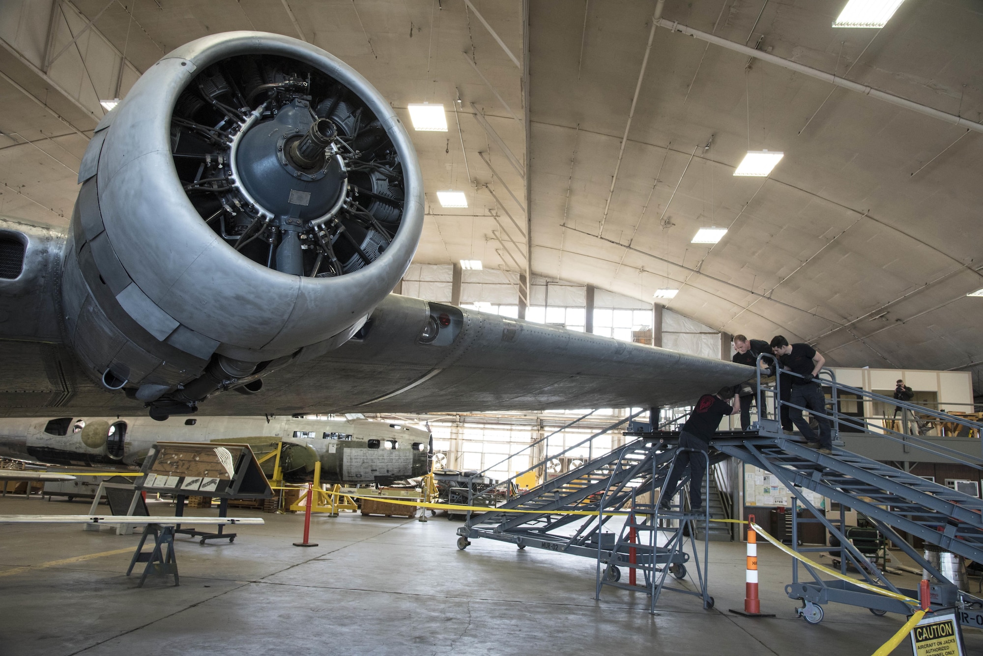 DAYTON, Ohio -- Restoration crews from the National Museum of the U.S. Air Force install the final wing-tip on the Boeing B-17F Memphis Belle™ on March 22, 2017. The famed B-17F Memphis Belle™ and its crew became iconic symbols of the heavy bomber crews and support personnel who helped defeat Nazi Germany. The Memphis Belle was the first US Army Air Forces heavy bomber to return to the US after completing 25 combat missions over Europe. The USAAF chose the Memphis Belle for a highly-publicized war bond tour from June-August 1943, and its crew was celebrated as national heroes. The aircraft and crew were also the subject of two widely-seen Hollywood movies (one in 1944 and another in 1990). The Memphis Belle will be placed on public display at the museum on May 17, 2018. (U.S. Air Force photo by Ken LaRock)