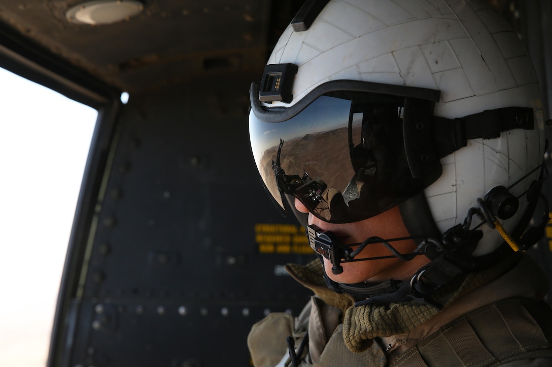 Lance Cpl. Gregory Ybarra, a UH-1Y crew chief with Marine Light Attack Helicopter Squadron (HMLA) 469, scans the desert for potential threats during a tactical recovery of aircraft and personnel (TRAP) training mission as part of Integrated Training Exercise (ITX) 3-17 at Marine Corps Air Ground Combat Center Twentynine Palms, Calif., May 17. ITX is a combined-arms training exercise enabling Marines across 3rd Marine Aircraft Wing to operate as an aviation combat element integrated with ground and logistics combat elements as a Marine air-ground task force. More than 650 Marines and 27 aircraft with 3rd MAW are supporting ITX 3-17. (U.S. Marine Corps photo by Sgt. David Bickel/Released)
