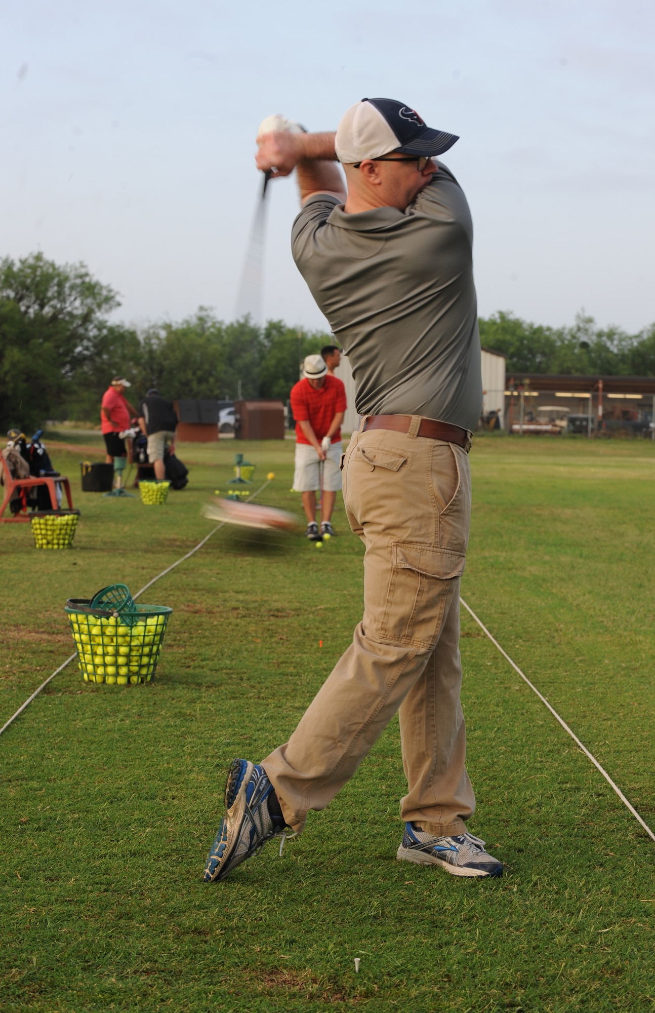 U.S. Air Force Master Sgt. Michael W. Coleman, 7th Security Forces Squadron non-commissioned officer in charge of operations, participates in a golf tournament as part of this year’s National Police Week events May 18, 2017 at Dyess Air Force Base, Texas. In 1962, President John F. Kennedy declared the calendar week in which May 15 falls be known as National Police Week. (U.S. Air Force Photo by Airman Kylee Thomas)