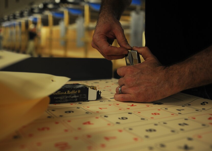 Tony Carlisle, City Center Security private security, loads bullets into a magazine May 19, 2017 at Dyess Air Force Base, Texas. Those who participated in the shooting competition competed for awards such as “Best Shooter” and “Worst Shooter” where they were recognized at the Police Week award ceremony. (U.S. Air Force Photo by Airman Kylee Thomas)