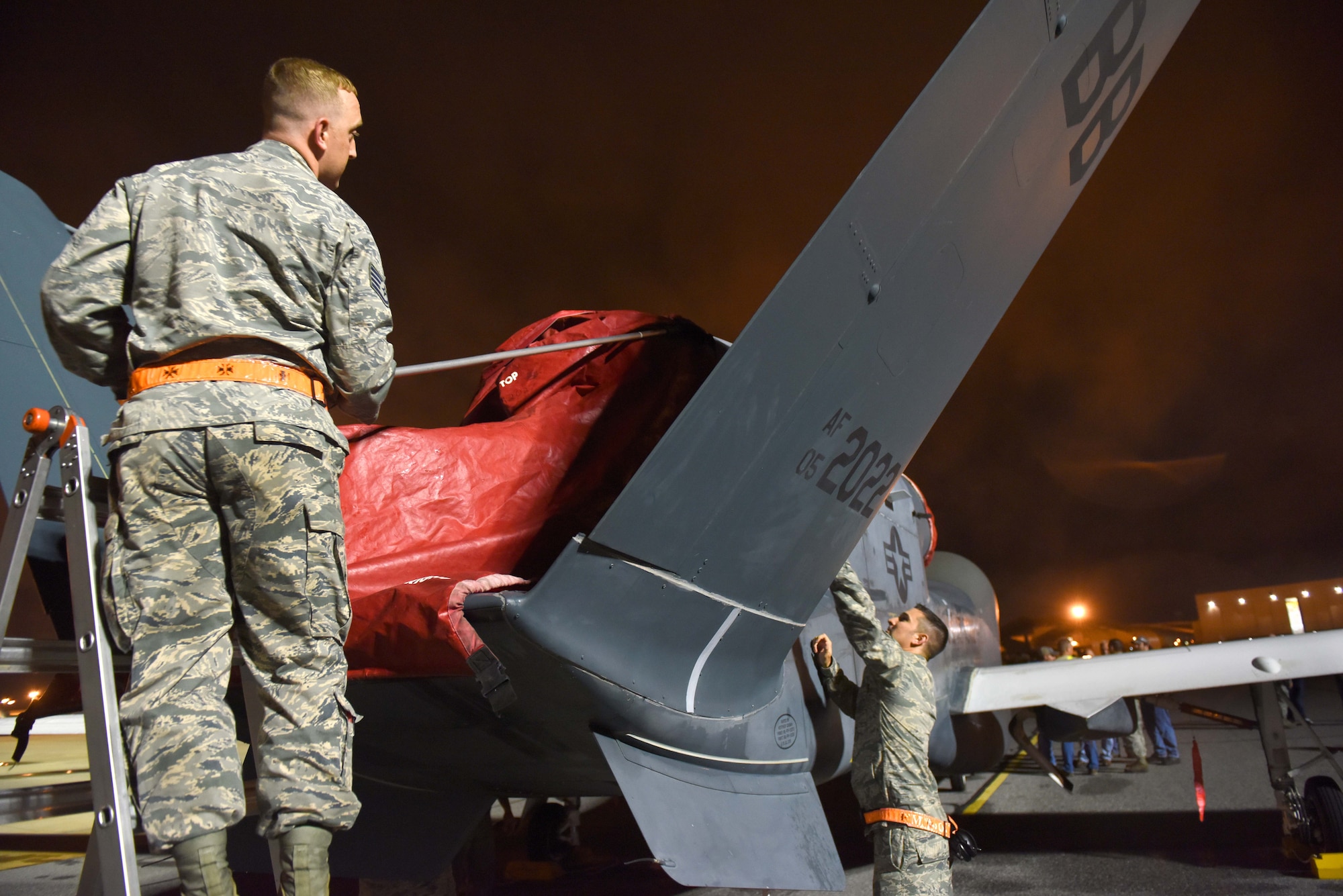 In the early morning hours of May 24, an RQ-4 Global Hawk landed at Robins Air Force Base. Aircraft routinely fly to Robins but this was the first one to land without a pilot onboard. To prepare for its arrival a building-based launch and recovery element was established. Robins maintenance professionals will provide an organic paint capability during the aircraft's stay here. (U.S. Air Force photos by Tommie Horton)