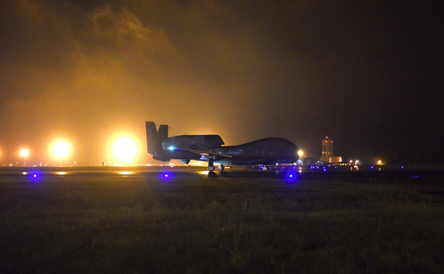 In the early morning hours of May 24, an RQ-4 Global Hawk landed at Robins Air Force Base. Aircraft routinely fly to Robins but this was the first one to land without a pilot onboard. To prepare for its arrival a building-based launch and recovery element was established. Robins maintenance professionals will provide an organic paint capability during the aircraft's stay here. (U.S. Air Force photos by Tommie Horton)