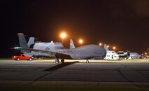 In the early morning hours of May 24, an RQ-4 Global Hawk landed at Robins Air Force Base. Aircraft routinely fly to Robins but this was the first one to land without a pilot onboard. To prepare for its arrival a building-based launch and recovery element was established. Robins maintenance professionals will provide an organic paint capability during the aircraft's stay here. (U.S. Air Force photos by Tommie Horton)