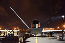 In the early morning hours of May 24, an RQ-4 Global Hawk landed at Robins Air Force Base. Aircraft routinely fly to Robins but this was the first one to land without a pilot onboard. To prepare for its arrival a building-based launch and recovery element was established. Robins maintenance professionals will provide an organic paint capability during the aircraft's stay here. (U.S. Air Force photos by Tommie Horton)