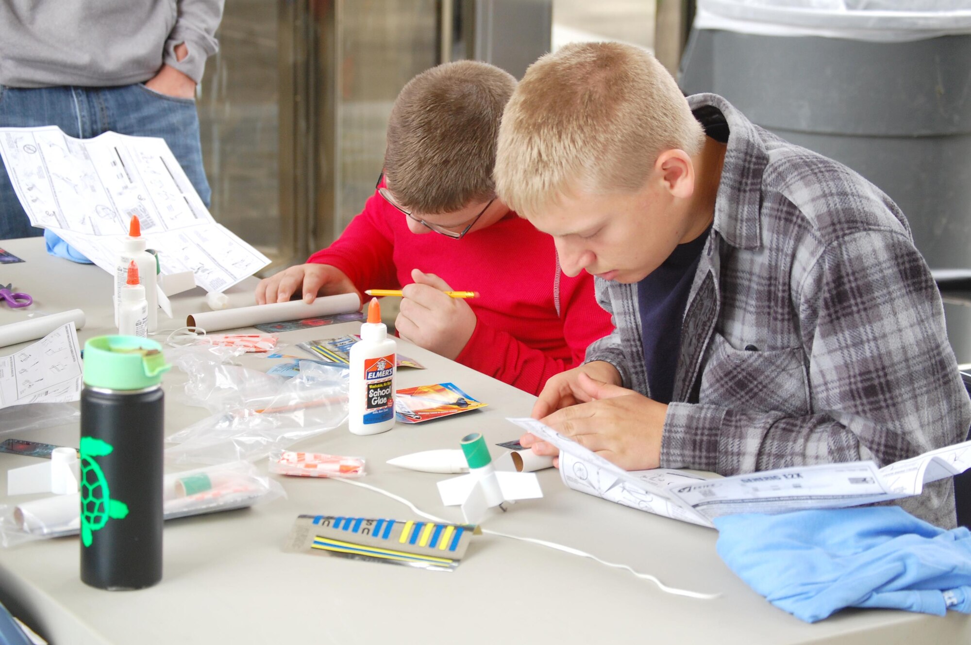Using the instructions and materials provided, students build their rockets for the Reach for the Stars Competition held May 13 at the University of Tennessee Space Institute. (Photo provided)