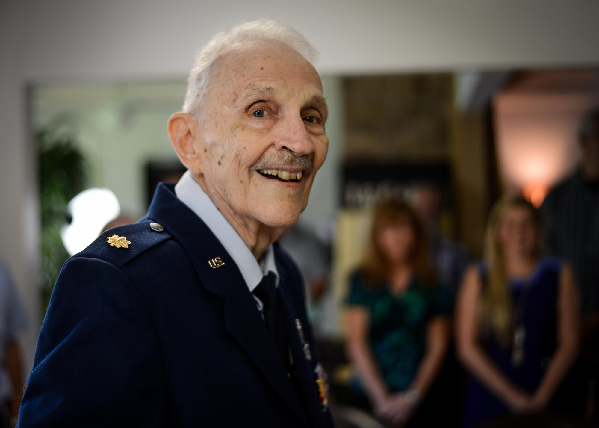 Retired Maj. Joe Campbell poses for a photo during a Distinguished Flying Cross presentation at his residence in Shreveport, La., May 18, 2017. Campbell is a veteran of World War II, the Korean War, and Vietnam and is also rated as both a pilot and navigator, as depicted here by his wearing two distinct sets of wings. (U.S. Air Force photo/Senior Airman Mozer O. Da Cunha)