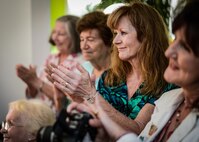 Guests applaud during retired Maj. Joe Campbell’s Distinguished Flying Cross Award Ceremony at his residence in Shreveport, La., May 18, 2017. Campbell was diagnosed with cancer 2016; with the diagnosis, family members reviewed his military records and discovered the medal was awarded but never presented. With the recent discovery, Barksdale Air Force Base leadership presented the award during a private ceremony at the Campbell residence. (U.S. Air Force photo/Senior Airman Mozer O. Da Cunha)