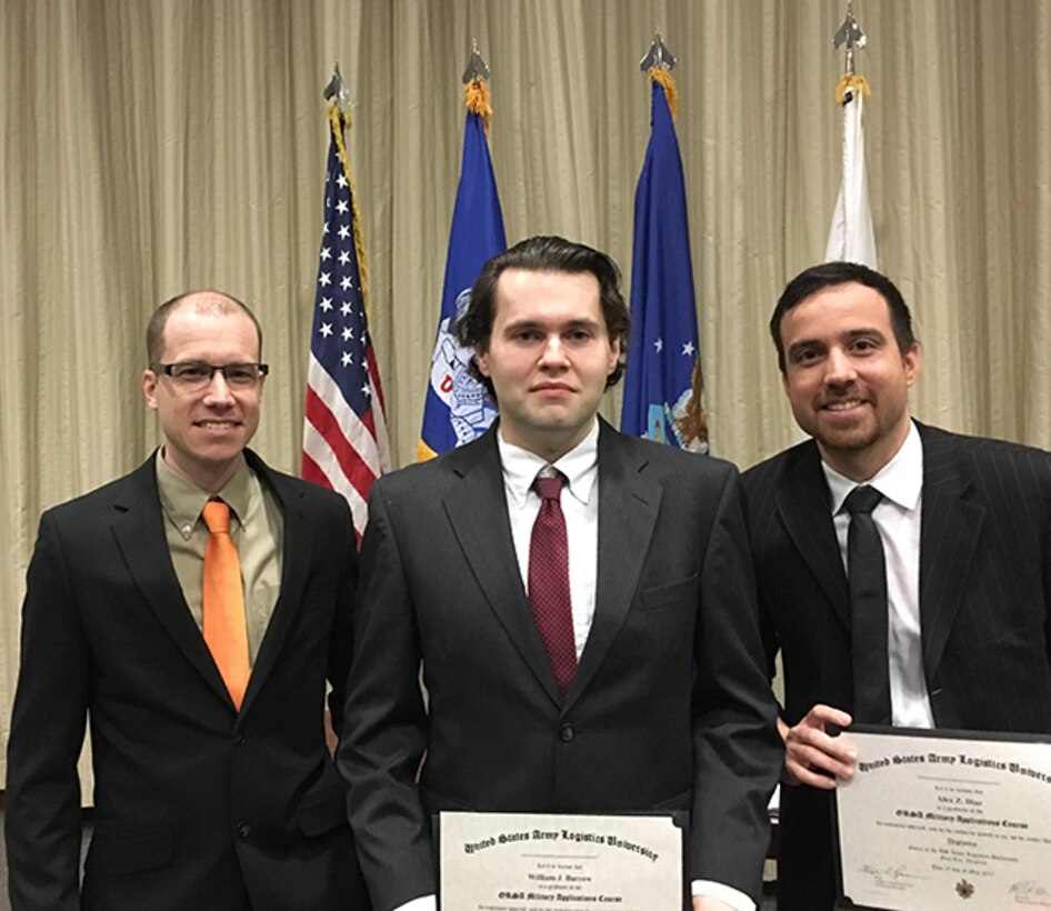 Defense Logistics Agency Office of Operations Research and Resource Analysis analysts Daniel Freas, William “Jack” Barrow, and Alex Diaz, from left, graduated from the Army Logistics University’s Operations Research and Resource Analysis Military Applications course at Fort Lee, Virginia, May 5, 2017.