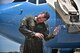 Maj. Jonathan Lauer, former executive officer for the 932nd Airlift Wing, dodges blasts of water during his fini flight ceremony May 22, 2017, Scott Air Force Base, Illinois. (U.S. Air Force photo by Christopher Parr)