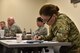 Air and Army National Guardsmen attend a three-day training Joint Reception Staging Onward Integration course May 23, 2017, at Warfield Air National Guard Base, Middle River, Md. Members traveled from as far as Wisconsin, Hawaii and Guam. (U.S. Air National Guard Photo by Airman Sarah M. McClanahan /Released by Master Sgt. Chris Schepers)