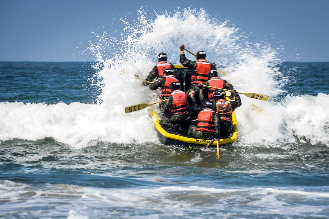 Navy basic underwater demolition/SEAL students conduct inflatable boat small surf passage training at the Naval Special Warfare Basic Training Command in Coronado, Calif., May 22, 2017. Navy photo by Petty Officer 1st Class Lawrence Davis