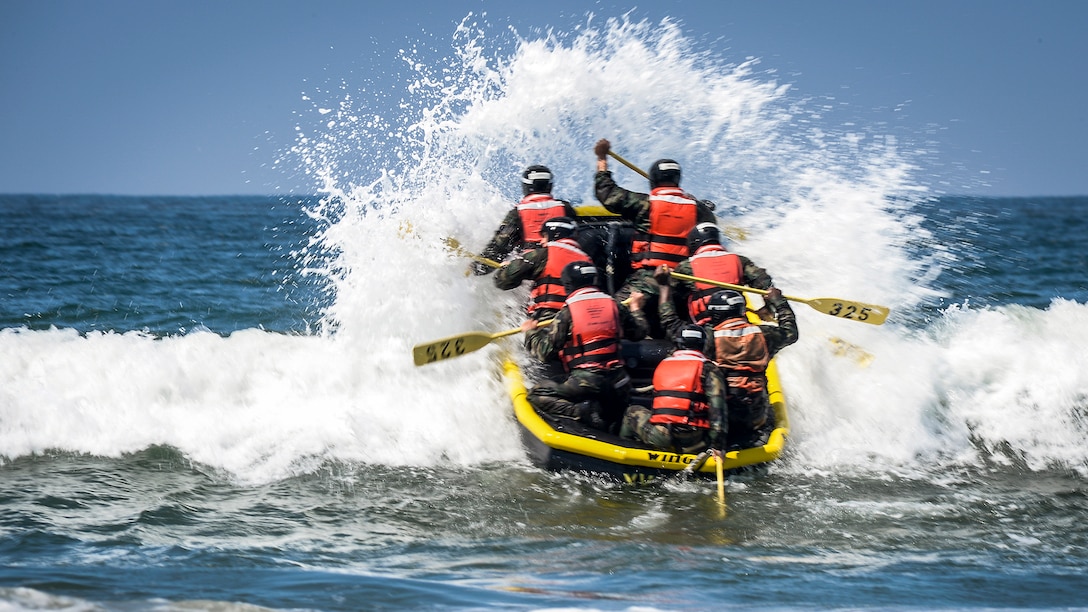 Navy basic underwater demolition/SEAL students conduct inflatable boat small surf passage training at the Naval Special Warfare Basic Training Command in Coronado, Calif., May 22, 2017. Navy photo by Petty Officer 1st Class Lawrence Davis