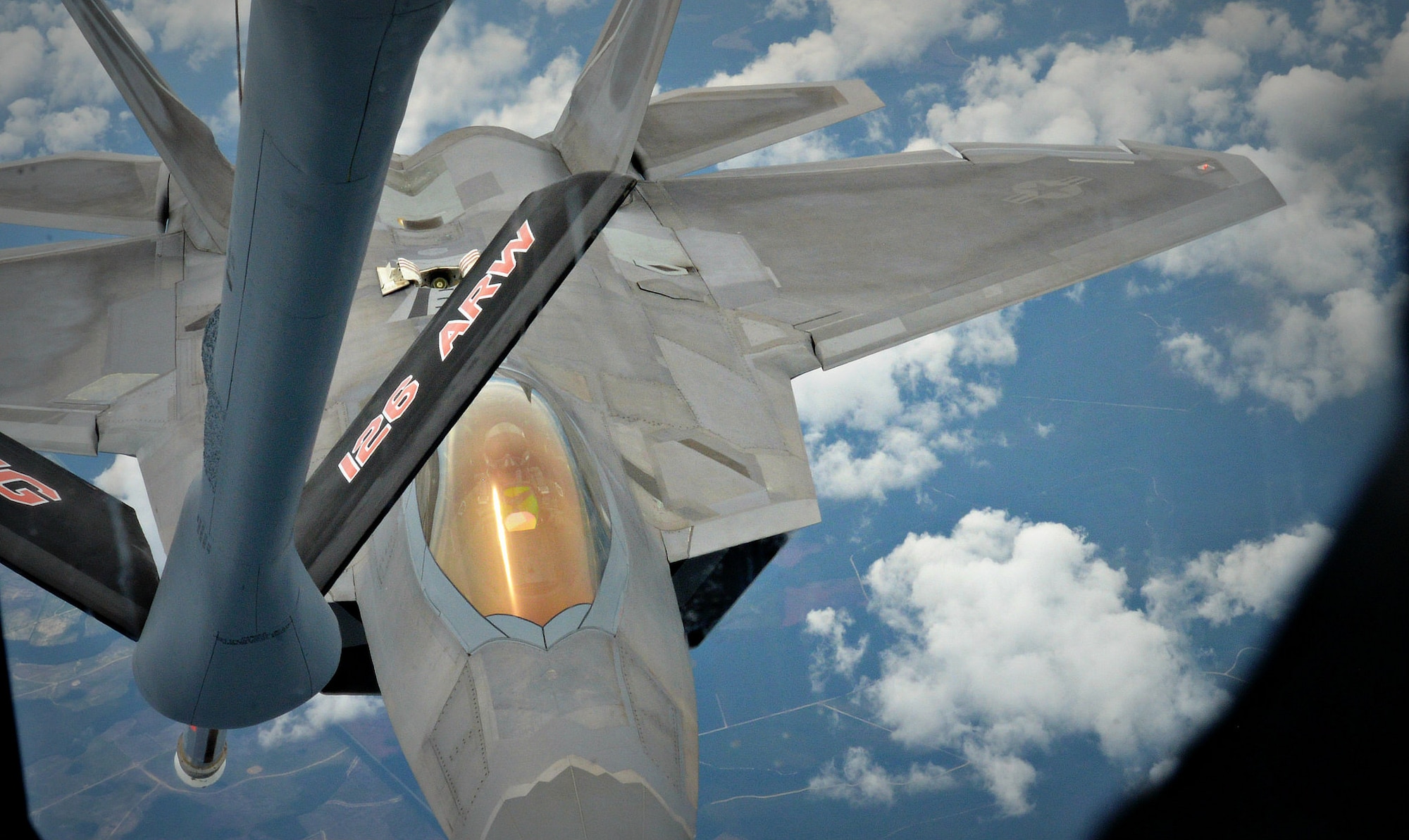 An aircraft with the Illinois Air National Guard’s 126th Refueling Wing prepares to refuel a Tyndall-based F-22. The aircraft was flown by members of the 906th Air Refueling Squadron, which is part of a Total Force Association effort between active duty and Guard military members to perform their mission. This was just one of the several messages communicated to the civics during the tour.