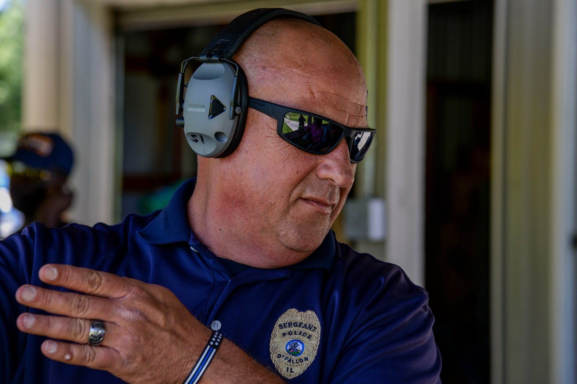 Craig Koch of the O’Fallon Police Department explains shooting techniques during the Police Week Shooting Competition at the O’Fallon and Fairview Heights Police Department Range May 15, 2017. During the shooting competition, participants tested their skills by firing both the pistol and tactical rifle. (U.S. Air Force photo by Airman Chad Gorecki)