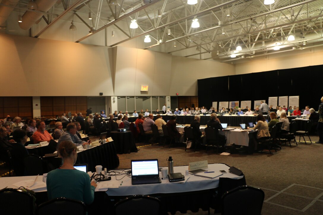 Members of the Missouri River Recovery Implementation Committee and support staff kick off the first day of their May plenary session.