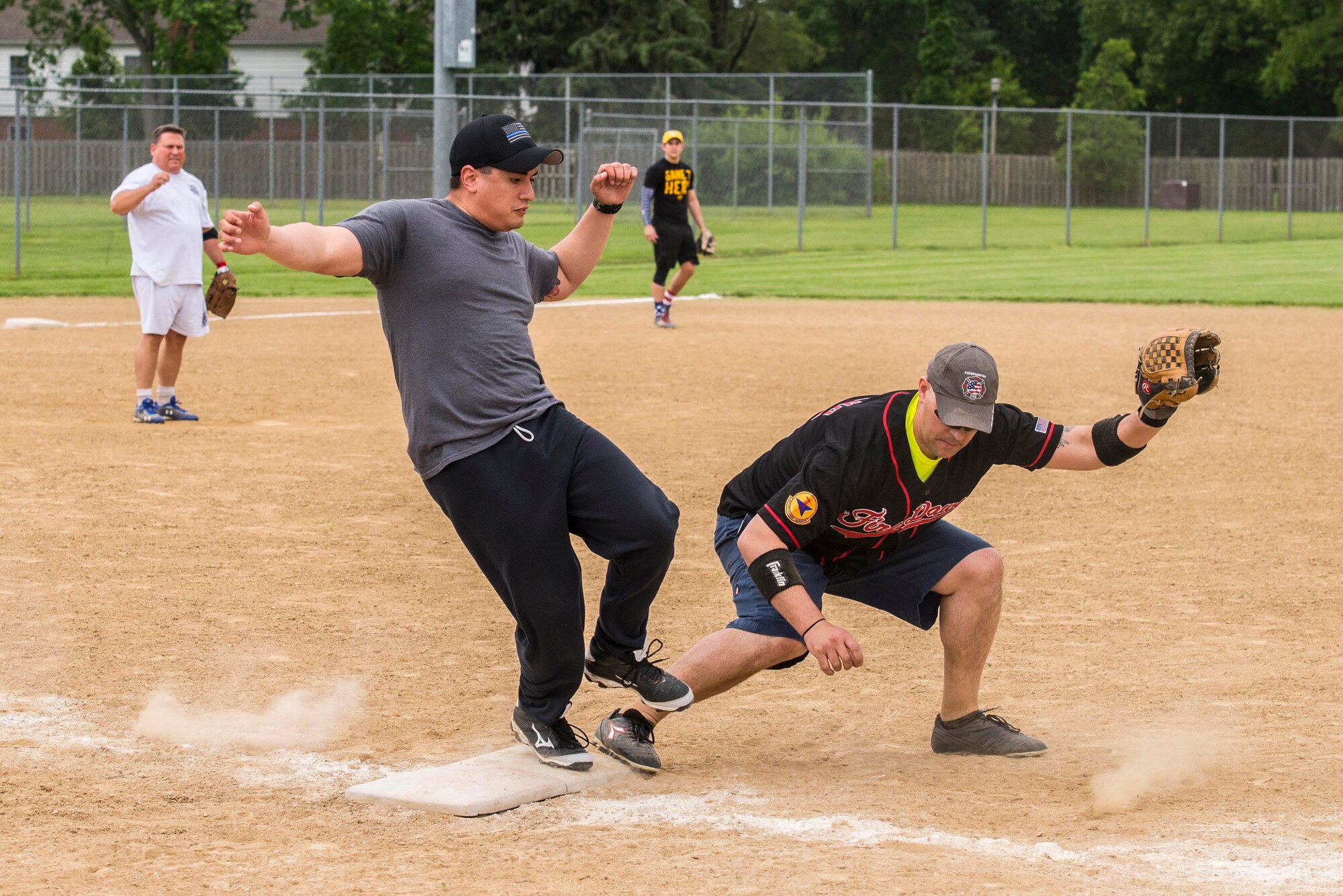 Scott's military police and first responders, along with law enforcement members from the surrounding communites, gathered together to play softball May 17 at Scott Air Force Base, Illinois. The gathering of everyone helped boost the comroderie with the base and local law enforcement. (U.S. Air Force photos/ Senior Airman Tristin English)