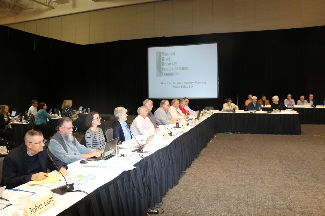 Members of the Missouri River Recovery Implementation Committee kick off the first day of their May plenary session.