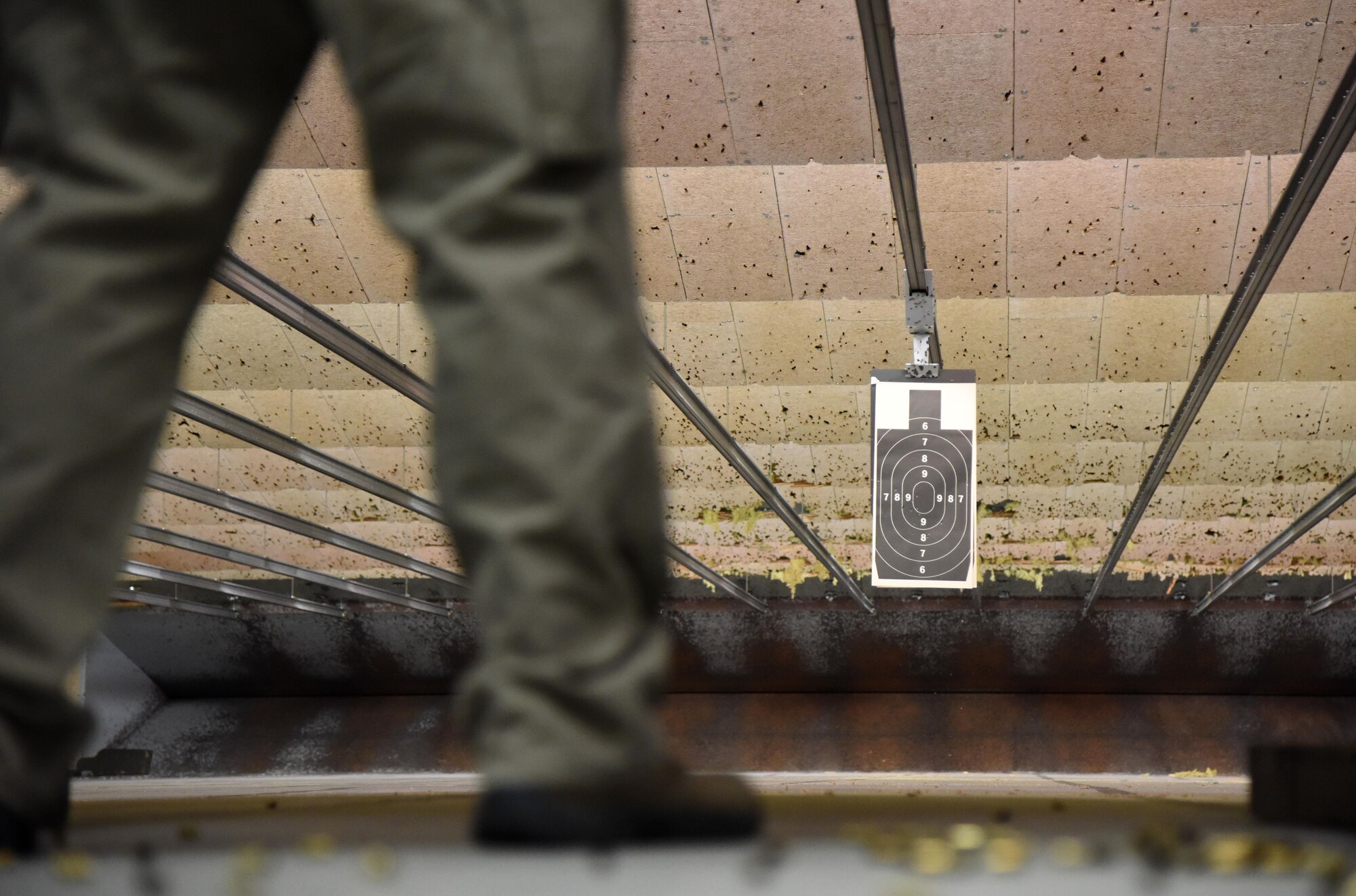A silhouette shooting target hangs down range during the 81st Security Forces Squadron open base pistol shoot at the indoor firing range May 15, 2017, on Keesler Air Force Base, Miss. The event was held during National Police Week, which recognizes the service of law enforcement men and women who put their lives at risk every day. (U.S. Air Force photo by Kemberly Groue)