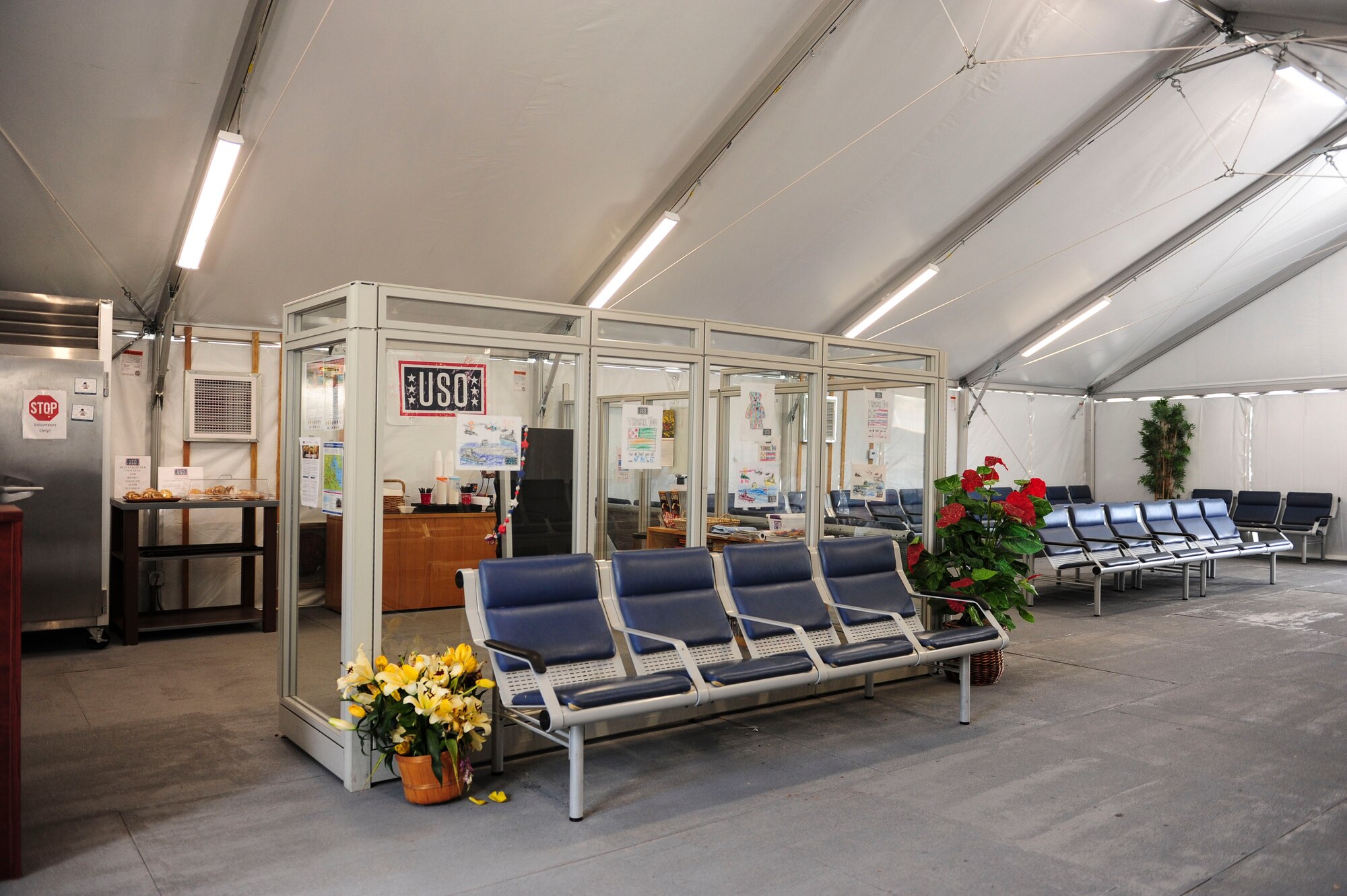 The USO is open and operating out of the temporary tents during Phase II renovations, Hickam Field, May 22, 2017. Air Mobility Command’s Space-A Passenger Terminal on Joint Base Pearl Harbor-Hickam, Hawaii, entered Phase II of its renovation plan.  Phase II involves the shutdown of the main concourse with services operating out of temporary tents. Anticipated completion of the $20.5 million dollar infrastructure project is set for Spring 2018. (U.S. Air Force photo by Tech. Sgt. Heather Redman)