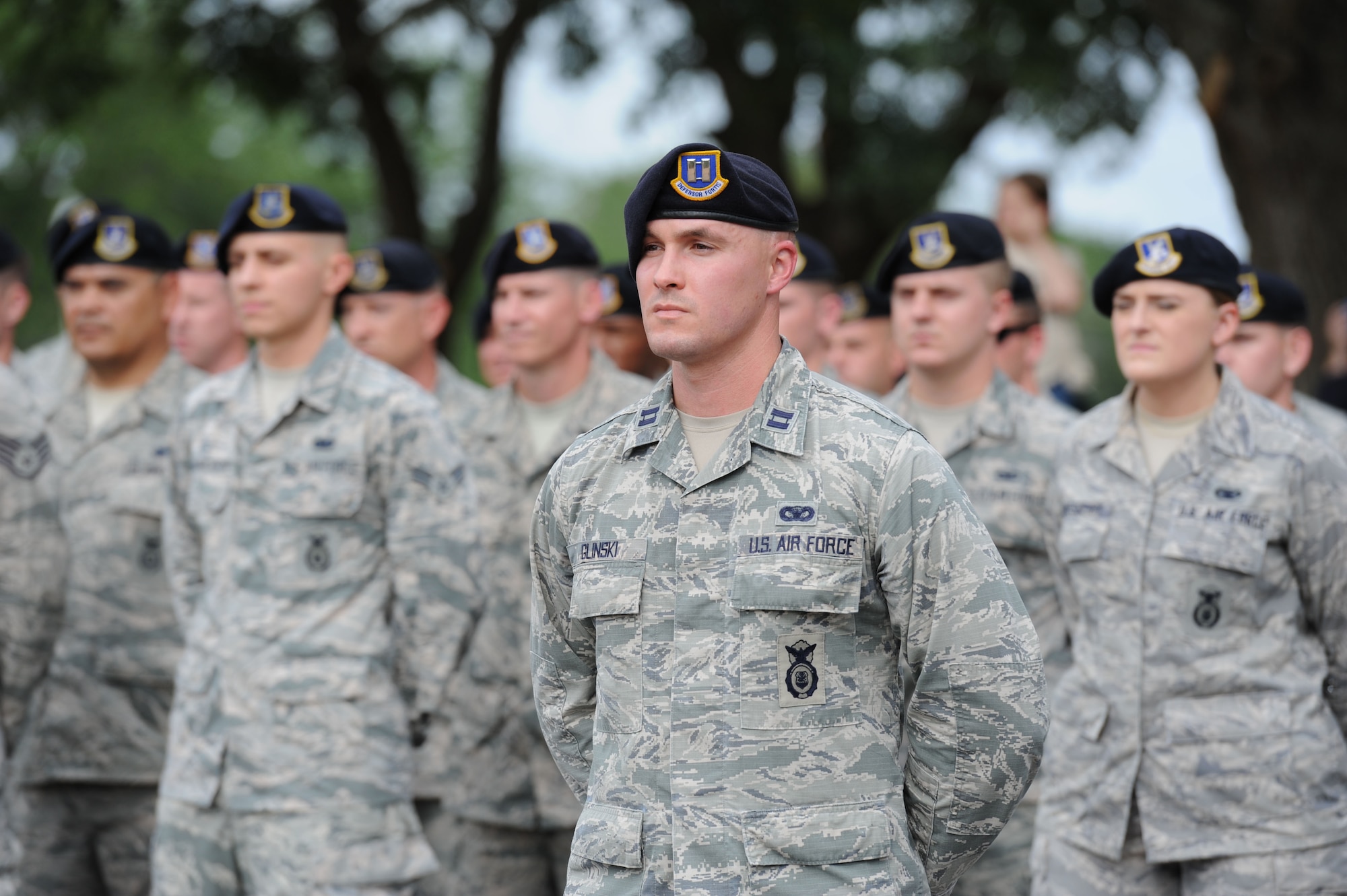 Capt. Harlan Glinski, 81st Training Wing command action group director, stands in formation during the 81st Security Forces Squadron retreat ceremony May 18, 2017, on Keesler Air Force Base, Miss. The event was held during National Police Week, which recognizes the service of law enforcement men and women who put their lives at risk every day. (U.S. Air Force photo by Kemberly Groue)