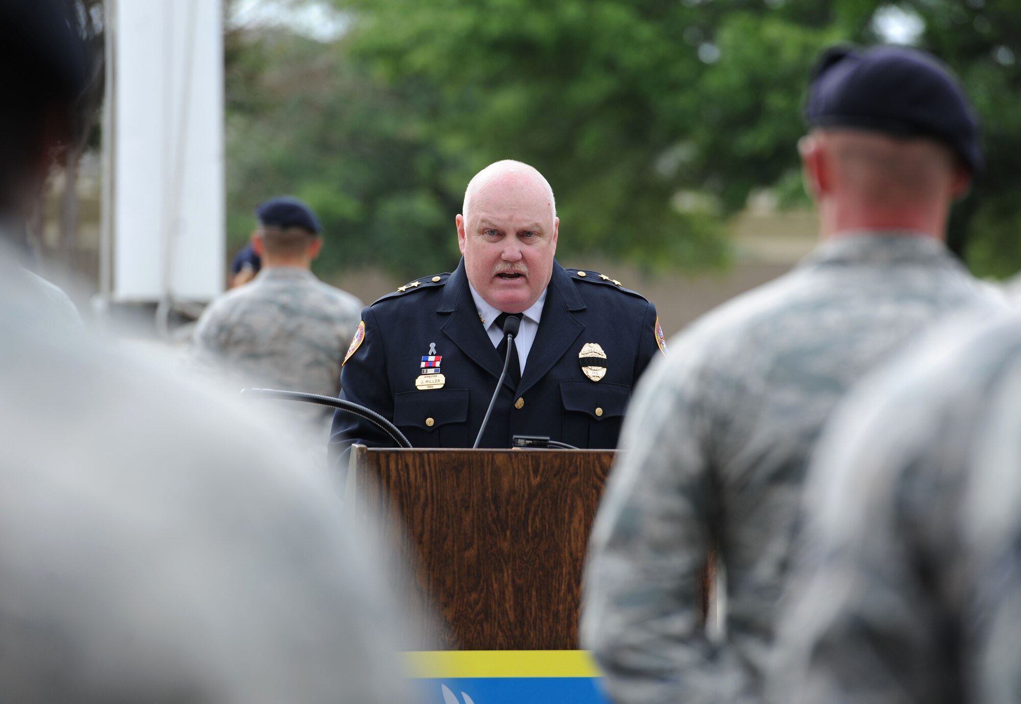 Chief John Miller, Biloxi Police Department director, delivers remarks during the 81st Security Forces Squadron retreat ceremony May 18, 2017, on Keesler Air Force Base, Miss. The event was held during National Police Week, which recognizes the service of law enforcement men and women who put their lives at risk every day. (U.S. Air Force photo by Kemberly Groue)