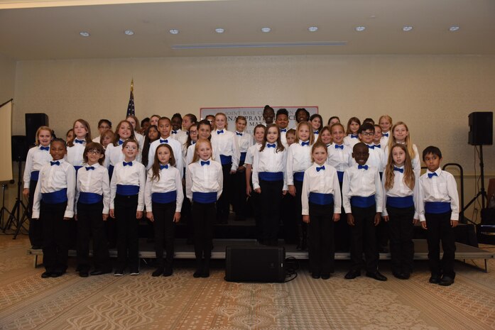 Marrington Elementary Children’s Choir prepares to sing the National Anthem during Joint Base Charleston’s Annual Prayer Luncheon at the Charleston Club May 23, 2017. The National Prayer Luncheon is an annual event bringing community members together for prayer and fellowship.