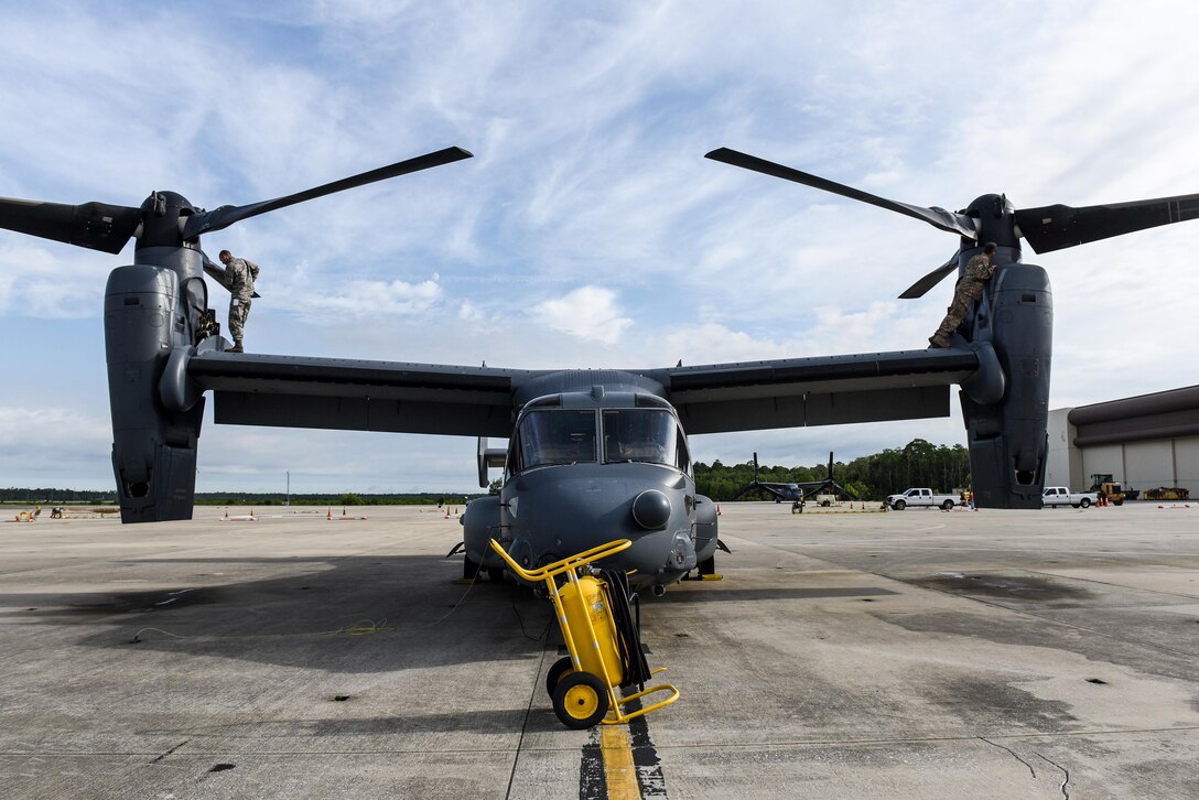 Senior Master Sgt. Shawn Martell, maintenance superintendent with the Florida Air National Guard Detachment 2, and Tech. Sgt. Jeremy Adams, a CV-22 Osprey crew chief with the FLANG Detachment 2, inspects a CV-22 at Hurlburt Field, Fla., May 24, 2017. The FLANG Det 2 employs officers and enlisted personnel in maintenance and aircrew positions to aid the 8th Special Operations Squadron and the 801st Special Operations Aircraft Maintenance Squadron. (U.S. Air Force photo by Staff Sgt. Jeff Parkinson)