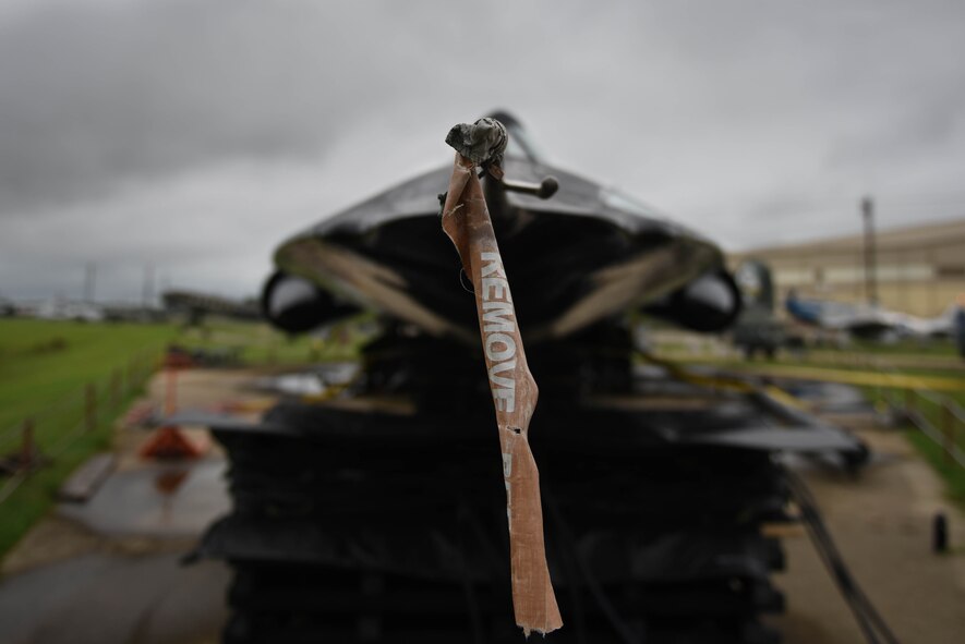 A static SR-71 Blackbird is being lifted at Barksdale Air Force Base, La., May 23, 2017. The purpose of the lift was to install supports underneath the landing gears to relieve pressure from the tires. (U.S. Air Force photo/Airman 1st Class Stuart Bright)