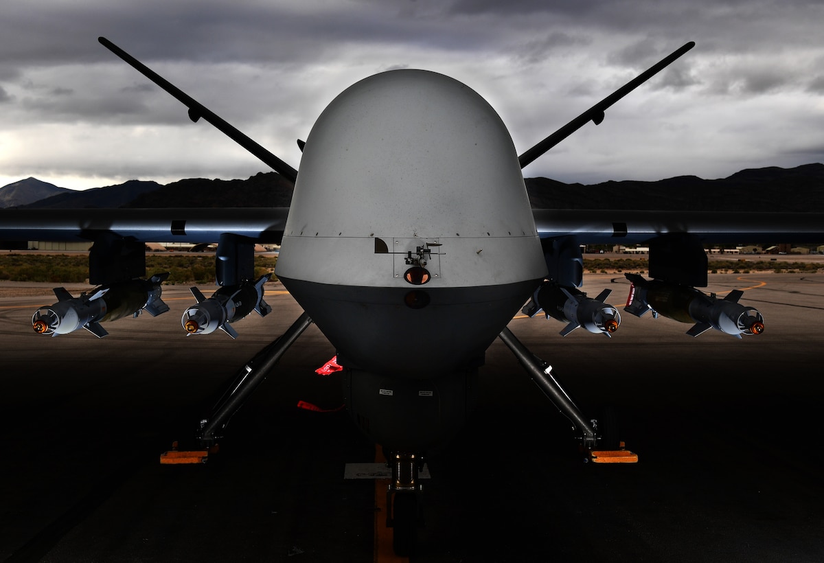 An MQ-9 Reaper, loaded with four GBU-12 Paveway II laser-guided bombs is ready for a training mission March 31, 2017, at Creech Air Force Base, Nev. The MQ-9, matched with a skilled aircrew, provides persistent attack and reconnaissance capabilities 24/7/365. (U.S. Air Force photo/Senior Airman Christian Clausen)