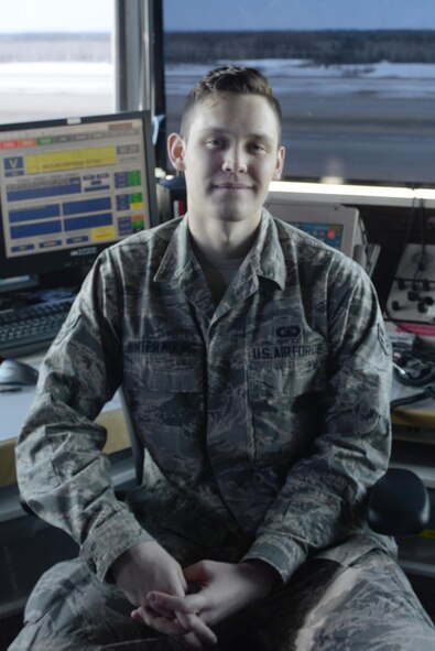 U.S. Air Force Airman 1st Class Kevin Winter-Molins, a 354th Operations Support Squadron air traffic controller, poses for a photo April 20, 2017, at Eielson Air Force Base, Alaska. Winter-Molins enjoys going outdoors to hike during his spare time and also plays the guitar. (U.S. Air Force photo by Airman Eric M. Fisher)