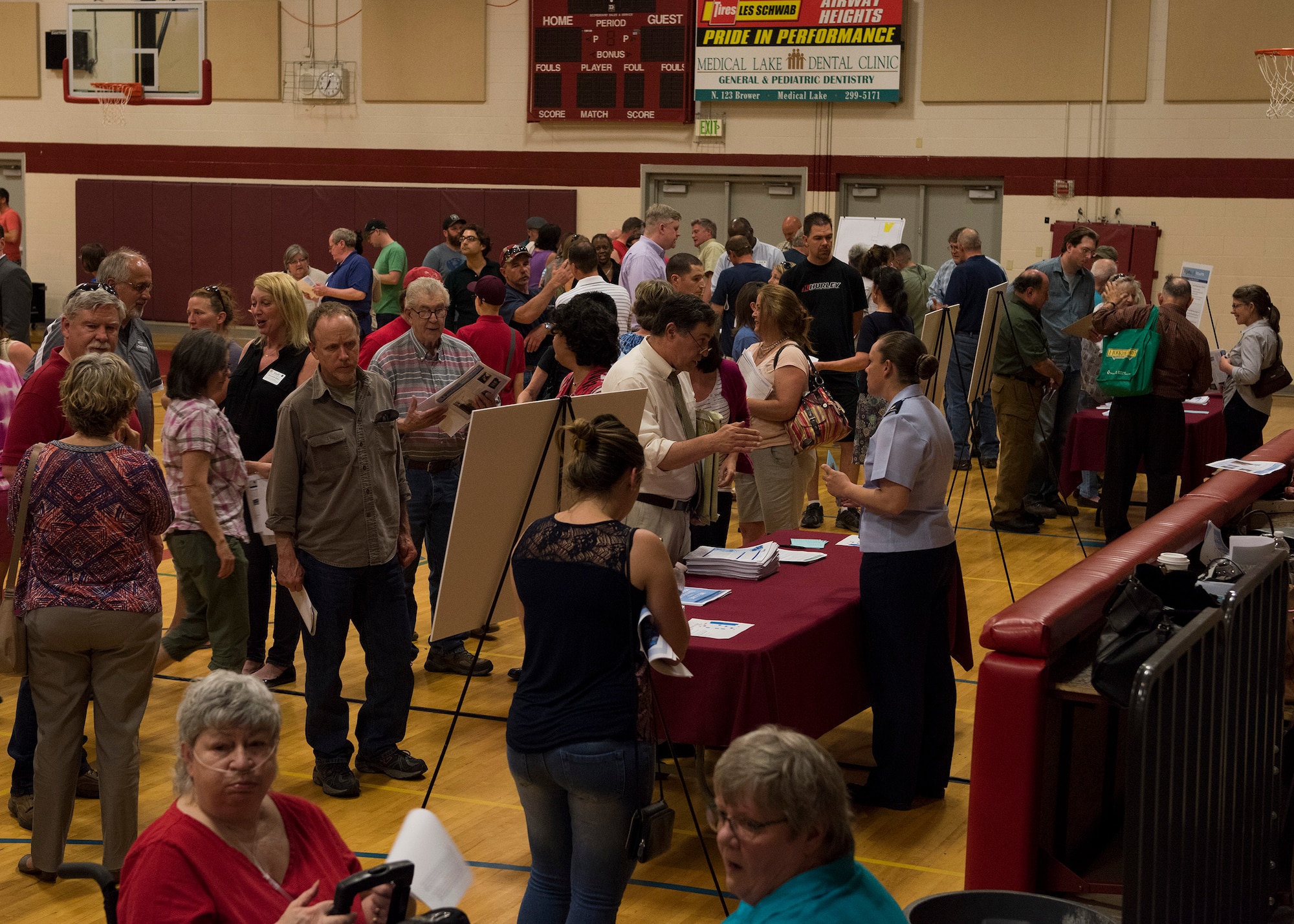 Local residents seek additional information about groundwater contamination at booths manned by local health, science and administrative authorities at Medical Lake High School, Medical Lake, Wash. May 23, 2017. Fairchild Air Force Base leadership and environmental specialists, in an act of transparency to the local community, arranged a public meeting and information-sharing session to help inform residents.
(U.S. Air Force photo / Airman 1st Class Ryan Lackey)
