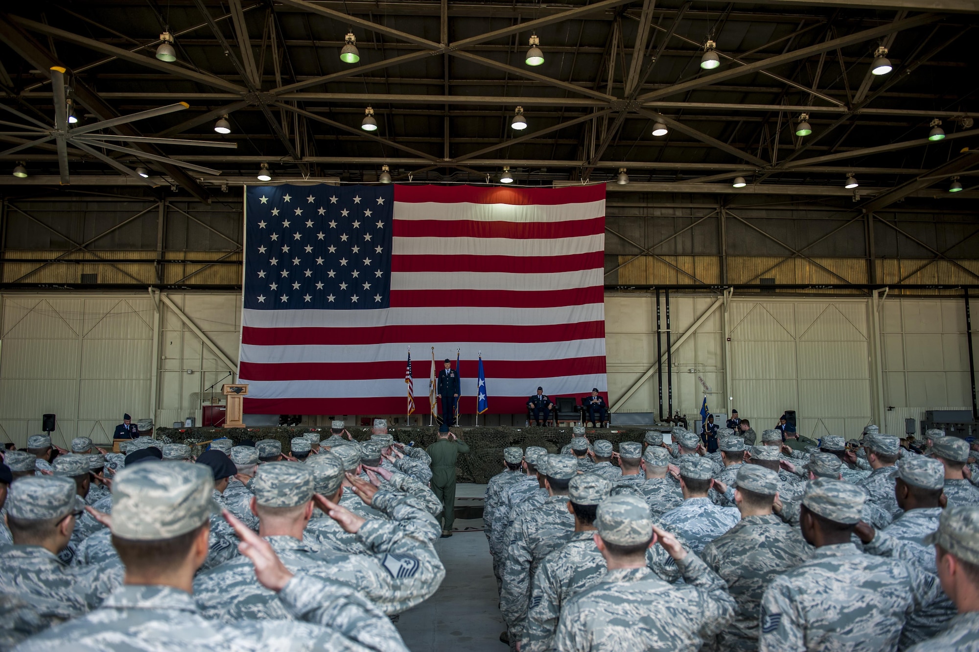 Members of the Wolf Pack render the initial salute to Col. David G. Shoemaker at the 8th Fighter Wing change of command ceremony at Kunsan Air Base, Republic of Korea, May 25, 2017. Shoemaker is the 57th commander to take the title of “Wolf.” (U.S. Air Force photo by Senior Airman Colville McFee/Released)