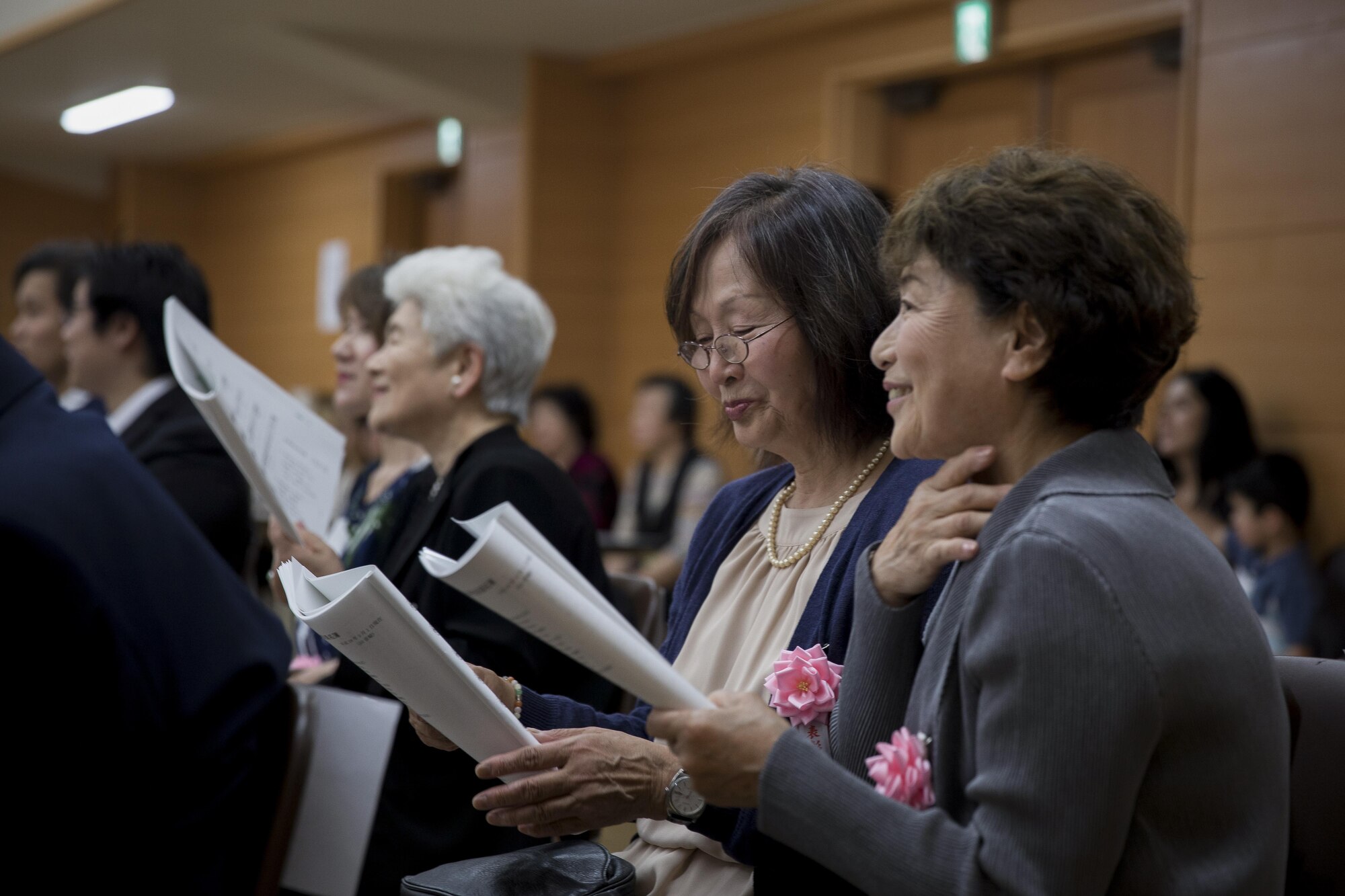 Good Deed Award recipients sing during the ceremony, May 20, 2017, at the Meiji Shrine, Tokyo, Japan. The Good Deed Award is an annual recognition of individuals or groups who have performed or encouraged good deeds within the community. (U.S. Air Force photo by Airman 1st Class Donald Hudson)