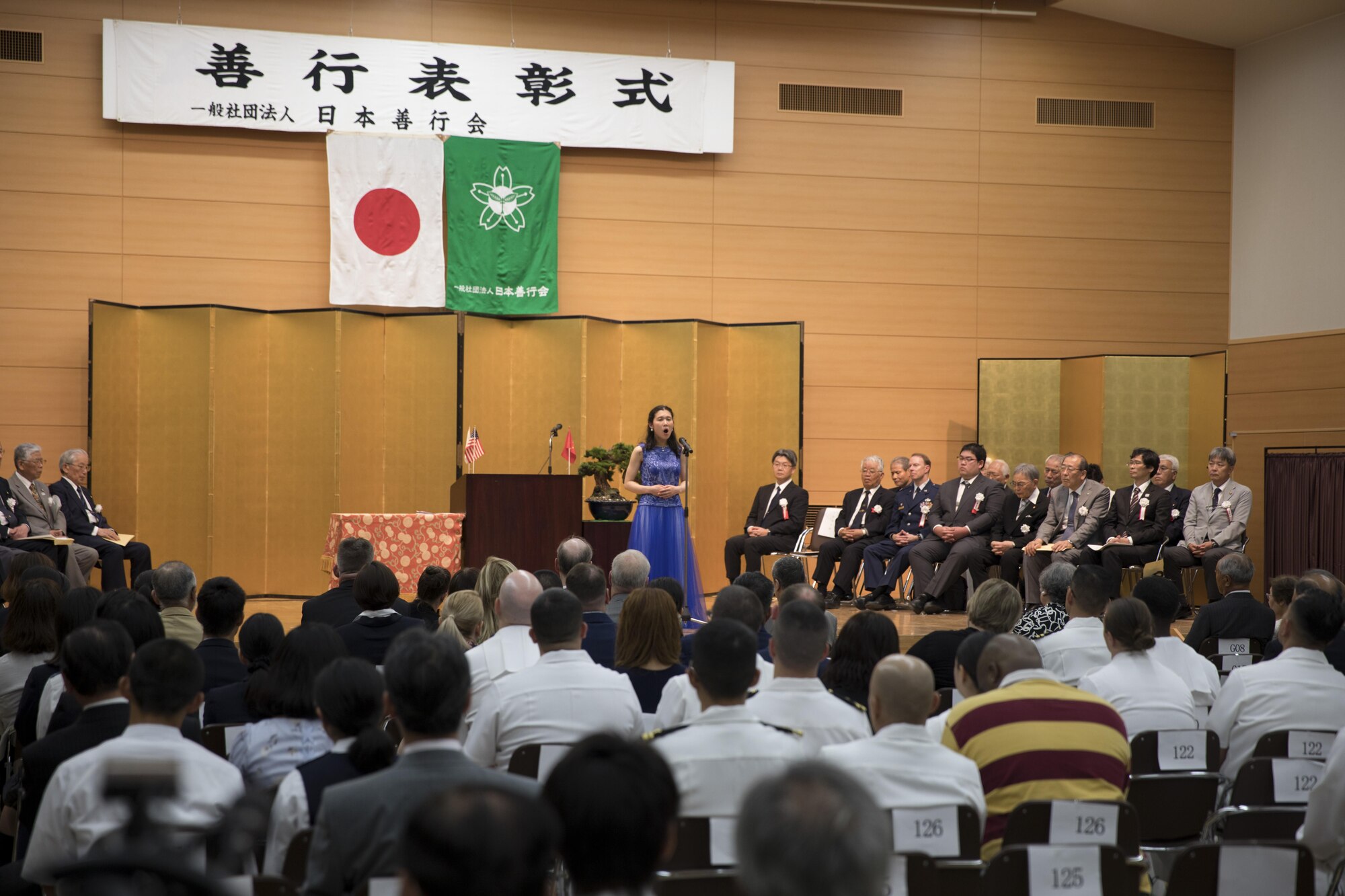 Takami Hirosawa, vocalist, performs at the Good Deed Award Ceremony, May 20, 2017, at the Meiji Shrine, Tokyo, Japan. The Good Deed Association is a non-profit organization under the management of the Cabinet Office of the Government of Japan and is committed to encouraging good conduct and enhancing mutual relationships among the members of the community. (U.S. Air Force photo by Airman 1st Class Donald Hudson)