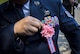 An Airman assigned to the 374th Airlift Wing adjusts his award decoration badge before the Good Deed Award Ceremony, May 20, 2017, at the Meiji Shrine, Tokyo, Japan. Five groups from Yokota Air Base received this year’s award by doing various acts of social welfare support, guidance of youths and children, contribution to public life, and good neighborhood programs.  (U.S. Air Force photo by Airman 1st Class Donald Hudson)