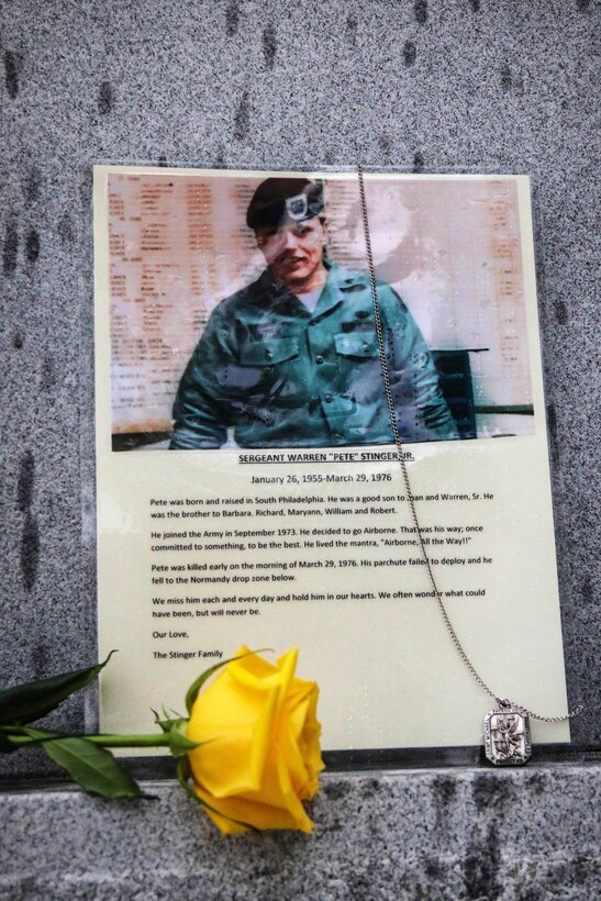 A photo of Army Sgt. Warren “Pete” Stinger Jr. rests at the bottom of the Combat Training Memorial during the All American Week Memorial Service at the 82nd Airborne Division War Memorial Museum at Fort Bragg, N.C., May 24, 2017. Army photo by Sgt. Jessica Nassirian
