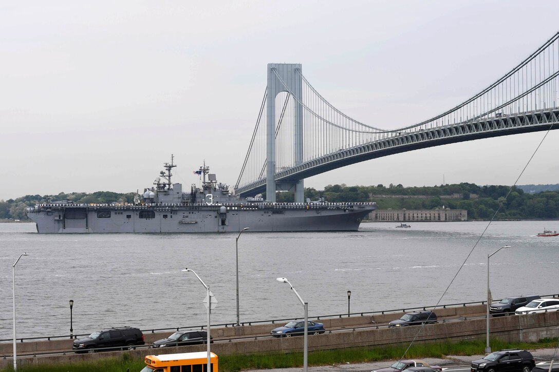 The amphibious assault ship USS Kearsarge passes under the Verrazano Narrows Bridge, during the parade of ships as part of Fleet Week New York in New York, May 24, 2017. Navy photo by Petty Officer 1st Class Kristin M. Schuster
