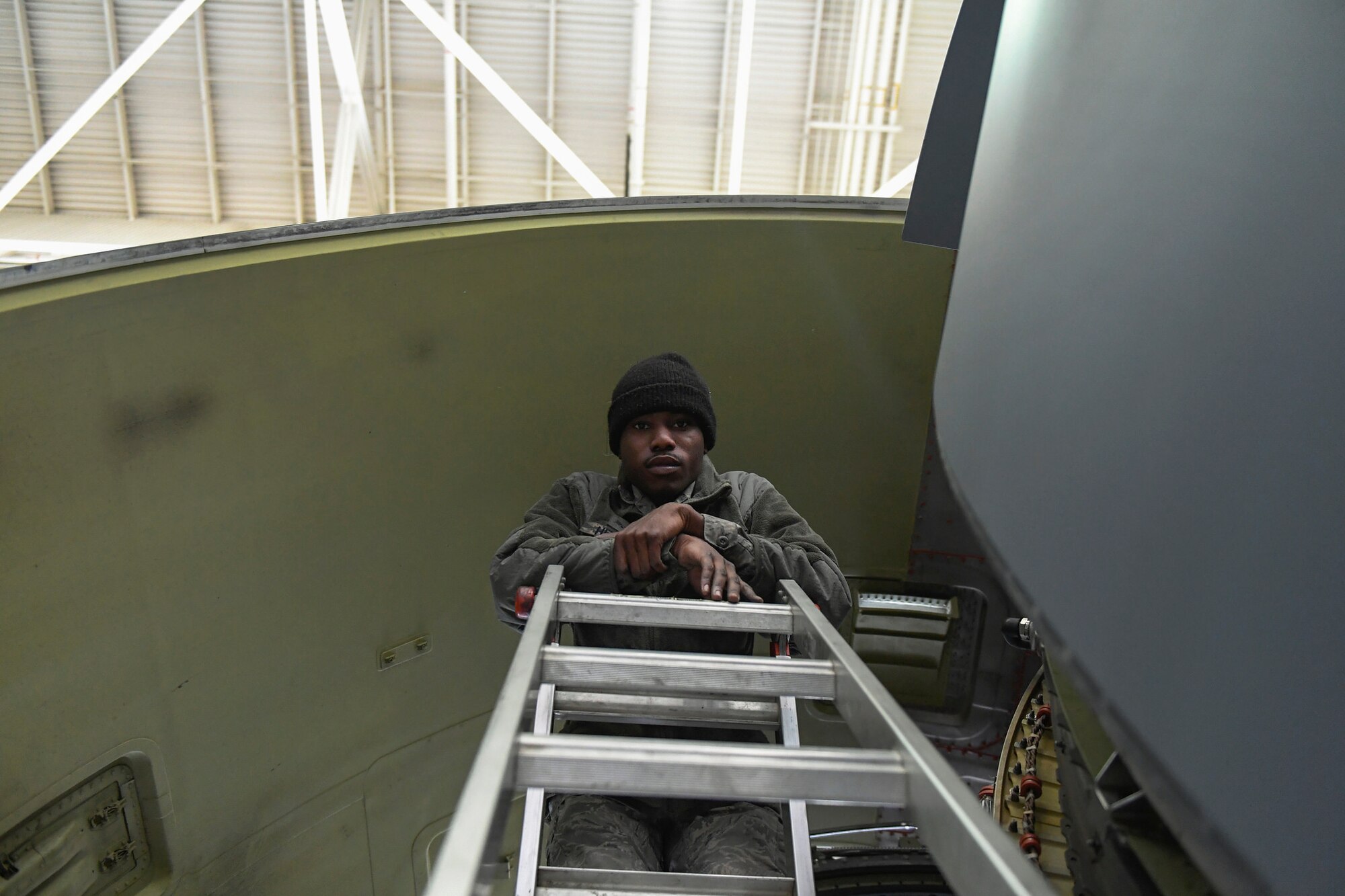 Senior Airman Chris Henry, a maintainer with the 605th Aircraft Maintenance Squadron, performs an engine swap on a KC-10 extender at Joint Base McGuire-Dix-Lakehurst, New Jersey, May 24, 2017. The engine swap takes 5 airmen about 24 hours to complete, the old engine will be sent to be refurbished if possible.