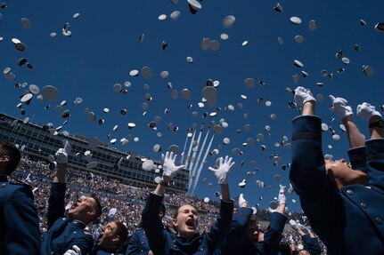 Class of 2017 Cadets are dismissed as the U.S. Air Force Thunderbirds in F-16 aircraft fly overhead during the U.S. Air Force Academy Graduation in Colorado Springs, Colo., May 24, 2017. The over 900 graduates will go on to serve as 2nd Lieutenants across the Air Force. 