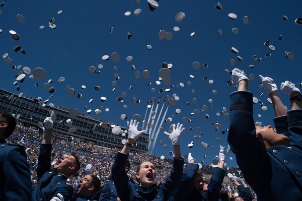 Class of 2017 Cadets are dismissed as the U.S. Air Force Thunderbirds in F-16 aircraft fly overhead during the U.S. Air Force Academy Graduation in Colorado Springs, Colo., May 24, 2017. The over 900 graduates will go on to serve as 2nd Lieutenants across the Air Force. 