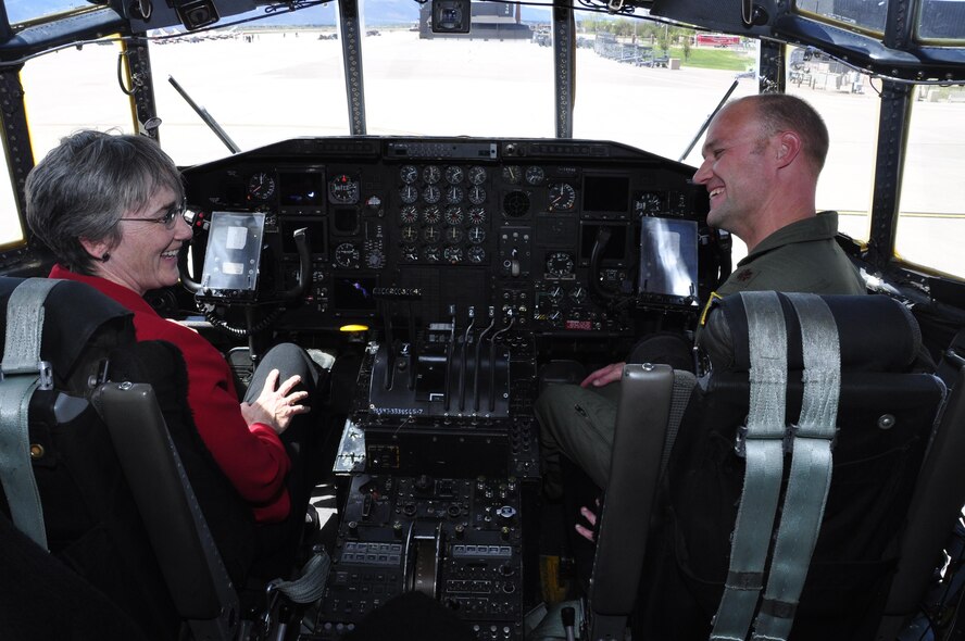 Secretary of the Air Force Heather Wilson, talks with Maj. Joseph Bennington, on the flight deck of an Air Force Reserve C-130 Hercules during her visit to Peterson Air Force Base, Colo., May 22, 2017. Bennington is a C-130 instructor pilot assigned to the 302nd Operations Support Squadron. Peterson AFB was the first official base visit for Wilson as Secretary of the Air Force. (U.S. Air Force photo/Staff Sgt. Frank Casciotta)
