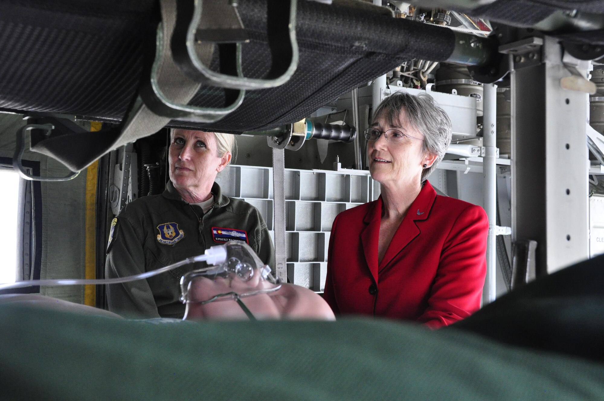 Lt. Col. Kimberly MacPherson, the 34th Aeromedical Evacuation Squadron director of operations and flight nurse, briefs Secretary of the Air Force Heather Wilson on the 302nd Airlift Wing’s capabilities and contributions to the U.S. Air Force’s aeromedical evacuation mission. The secretary had the opportunity to view up-close a portable U.S. Forest Service Modular Airborne Fire Fighting System used during 302nd AW C-130 MAFFS missions and meet with Reserve Citizen Airmen from the wing’s 34th Aeromedical Evacuation Squadron, 302nd Security Forces Squadron and 302nd Operations Group. The May 22, 2017 visit to Peterson Air Force Base was the first official base visit for Wilson as Secretary of the Air Force. (U.S. Air Force photo/Staff Sgt. Frank Casciotta)