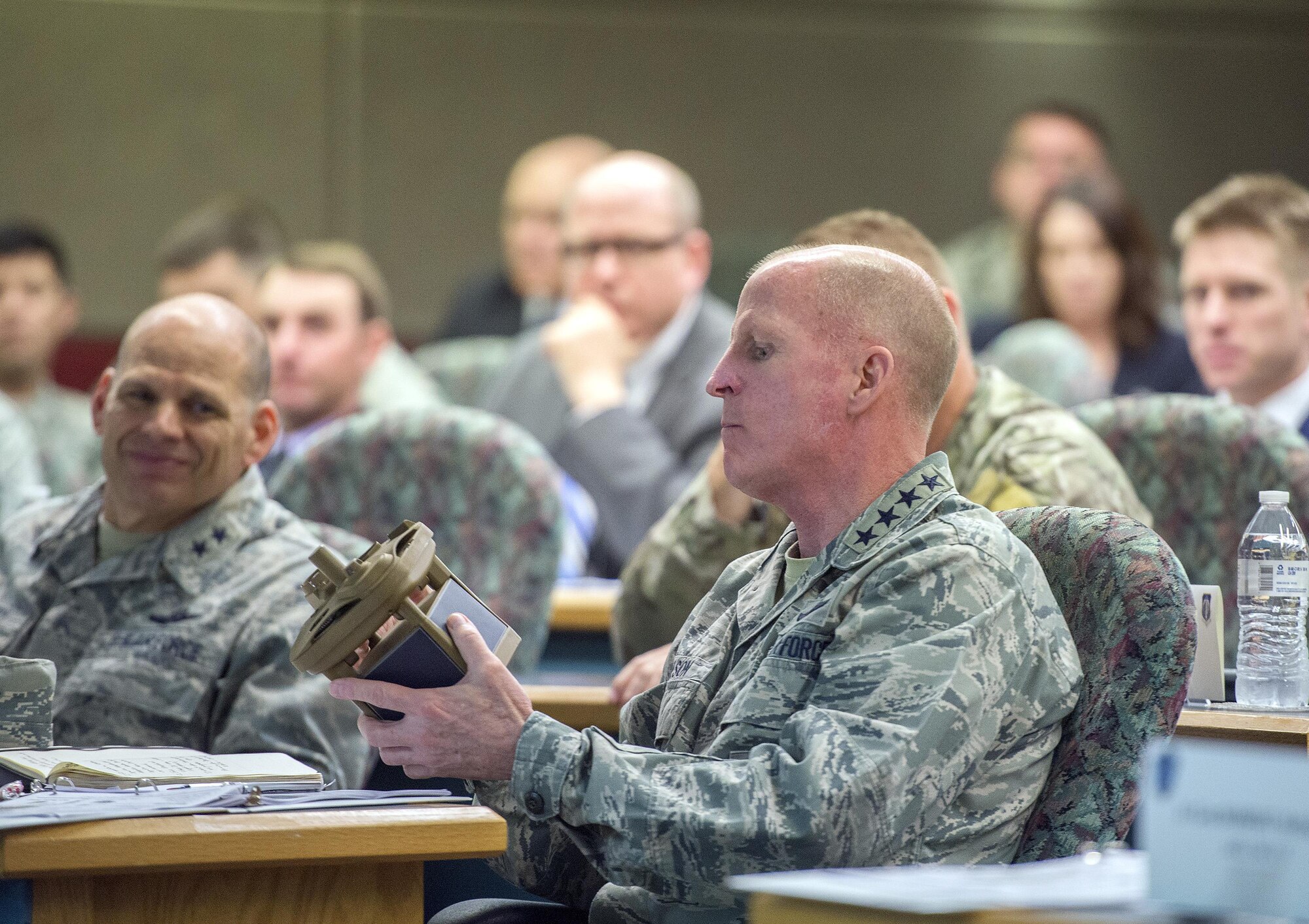 Gen. Stephen Wilson, Air Force vice chief of staff, looks over a micro weather sensor during a briefing at the Air Force Life Cycle Management Center’s Intelligence, Surveillance and Reconnaissance and Special Operations Forces Directorate headquartered at Wright-Patterson Air Force Base, Ohio, May 10, 2017. Wilson was briefed on new equipment being developed for Battlefield Airmen. (U.S. Air Force photo by R.J. Oriez) 