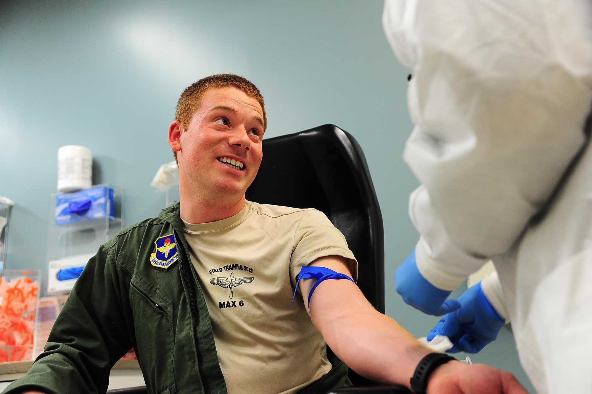 Second Lt. Patrick Finn, 14th Student Squadron Student Pilot, prepares to give a blood sample May 22, 2017, at Columbus Air Force Base, Mississippi. The lab technicians do their best to keep patients calm and relaxed while taking blood samples. (U.S. Air Force photo by Airman 1st Class Beaux Hebert)