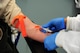 Senior Airman Lisa Jackson, 14th Medical Support Squadron Laboratory Technician, draws blood from 2nd Lt. Patrick Finn, 14th Student Squadron Student Pilot, May 22, 2017, at Columbus Air Force Base, Mississippi. Lab technicians must be good multitaskers and have great attention to detail to provide accurate results for their patients. (U.S. Air Force photo by Airman 1st Class Beaux Hebert)