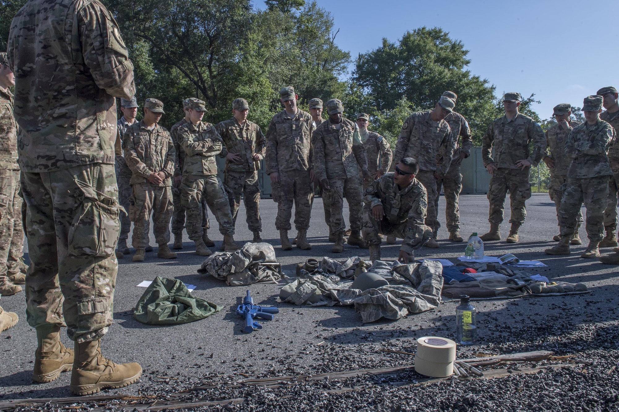 Tech. Sgt. Jose Deleon, 820th Combat Operations Squadron NCO in charge of deployed radio frequency systems and lead assessment instructor, demonstrates how to properly lay out mandatory items for an inspection during a Army Air Assault assessment, May 16, 2017, at Moody Air Force Base, Ga. Twenty-six Airmen attended the assessment which measured candidates’ aptitude in Air Assault operations, completion of equipment layouts, and rappelling. (U.S. Air Force photo by Tech. Sgt. Zachary Wolf)