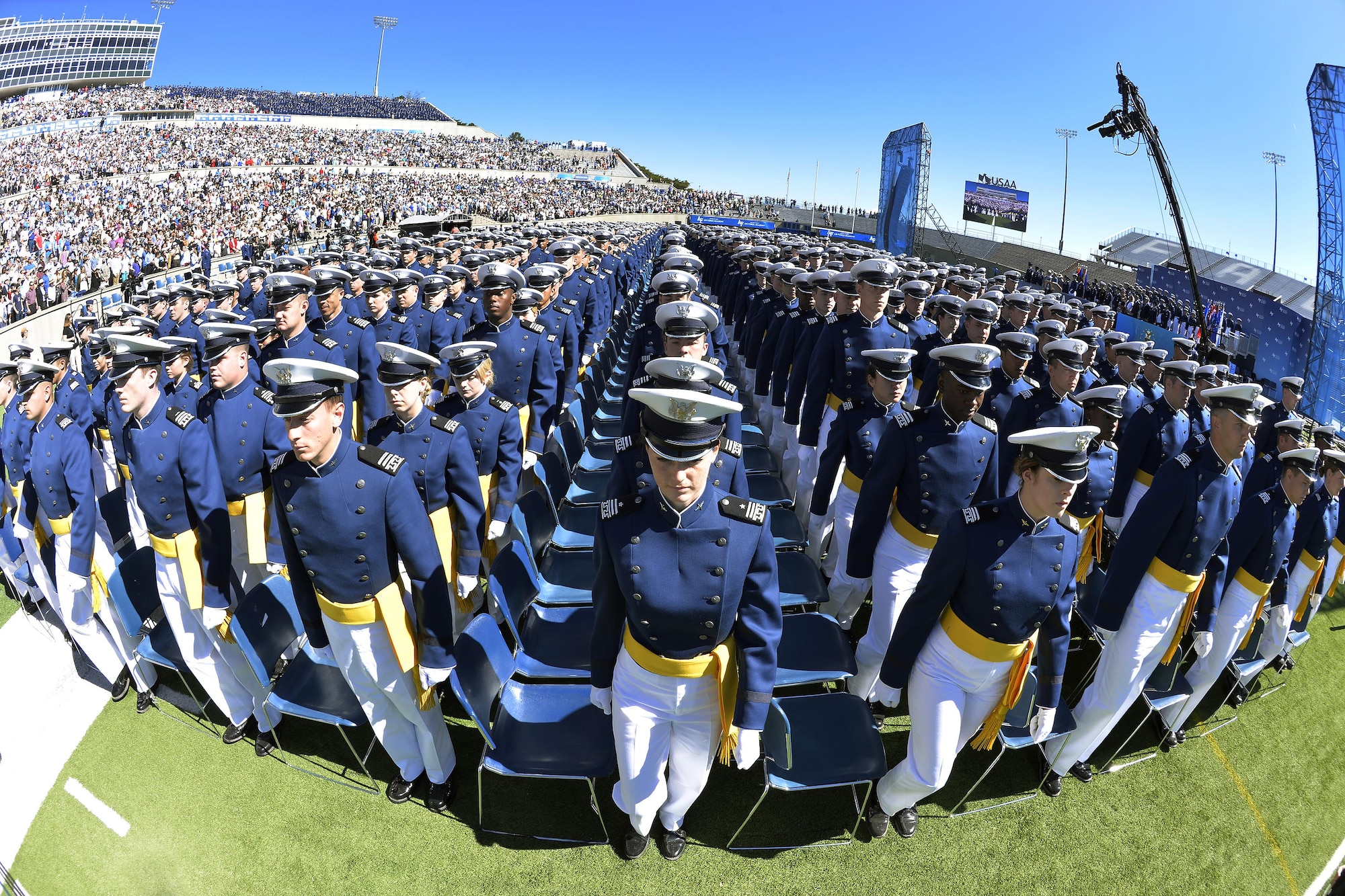 The Class of 2017 at the U.S. Air Force Academy gets ready to take their seats in Falcon Stadium before their graduation ceremony begins, May 24, 2017. (U.S. Air Force photo/Bill Evans)