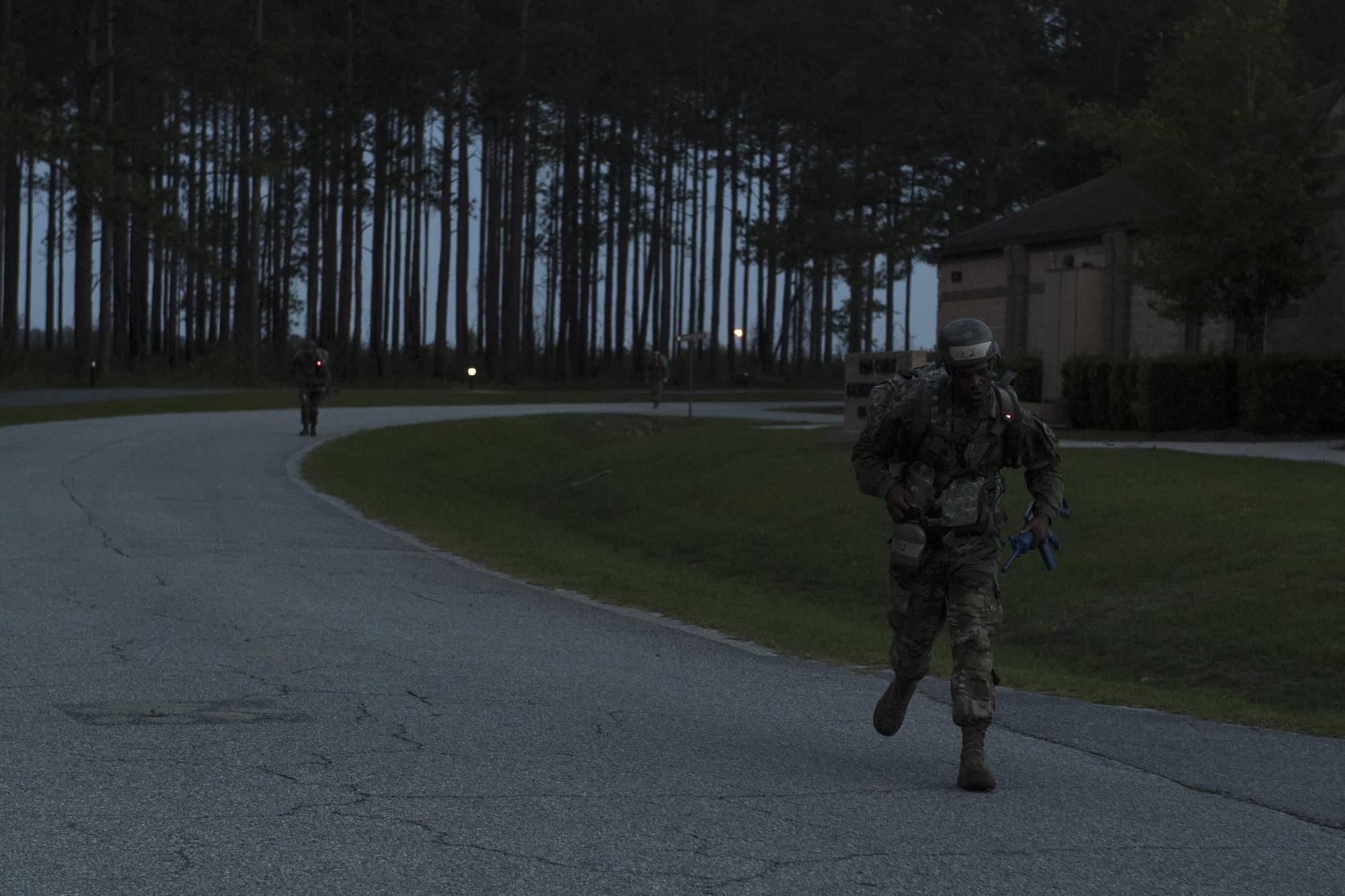 Airman 1st Class Robert Moses, 822nd Base Defense Squadron fire team member, finishes his 12-mile ruck march during an Army Air Assault assessment, May 19, 2017, at Moody Air Force Base, Ga. Twenty-six Airmen attended the assessment which measured candidates’ aptitude in Air Assault operations, completion of equipment layouts, and rappelling. (U.S. Air Force photo by Tech. Sgt. Zachary Wolf)