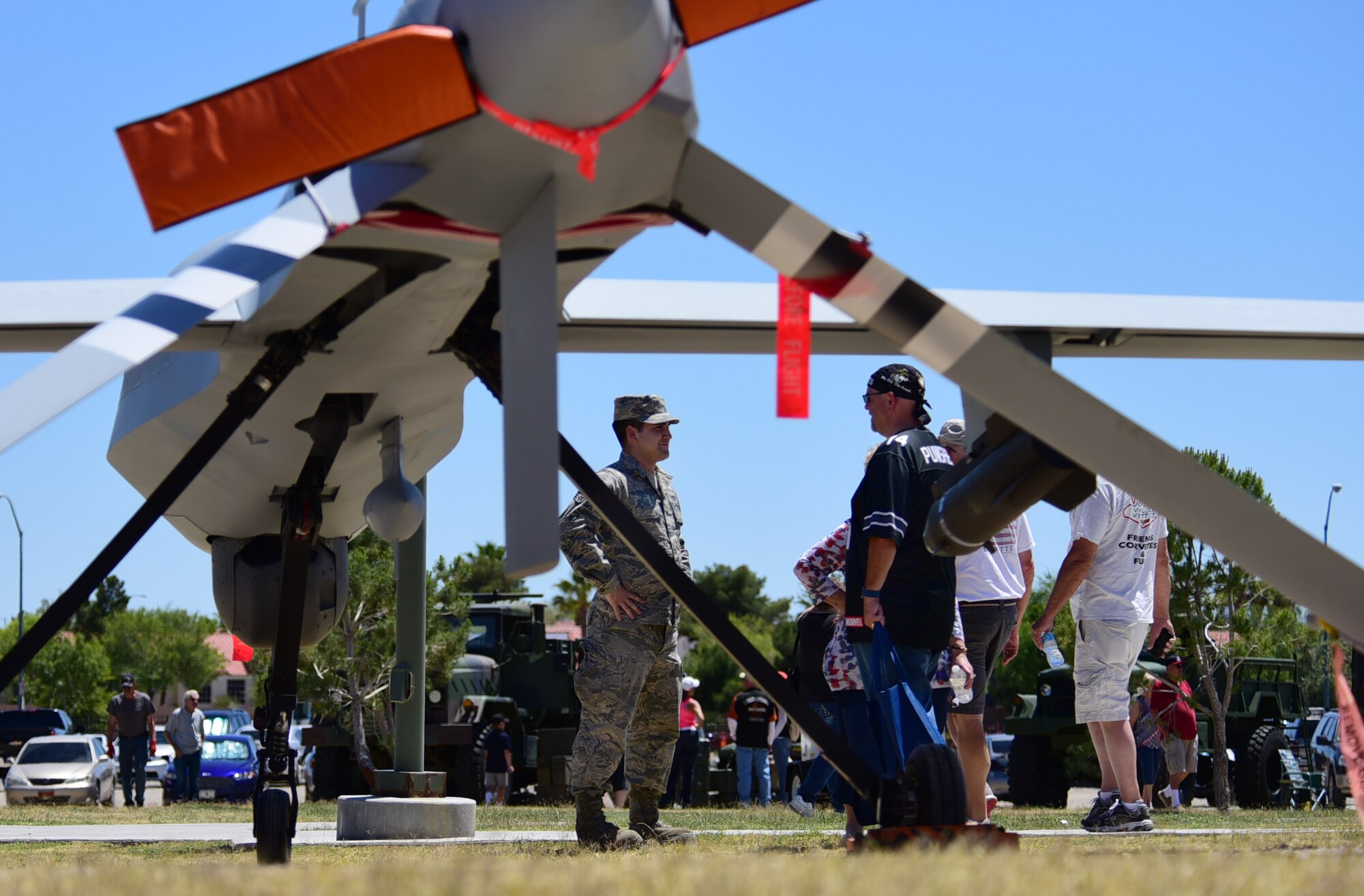 An MQ-1 Predator maintainer answers questions about the aircraft during the American Patriot Festival May 20, 2017, in Las Vegas. The MQ-1 maintenance Airmen showcased the capabilities of the Predator among other military displays at the event. (U.S. Air Force photo/Senior Airman Christian Clausen)